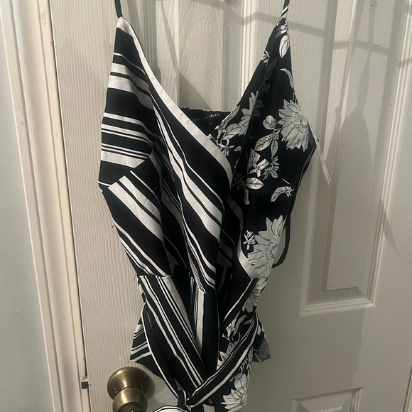 White House Black Market Tops - Black and white floral pattern blouse from White House black market. Size 12 NWT